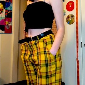 black tube top and yellow plaid trousers